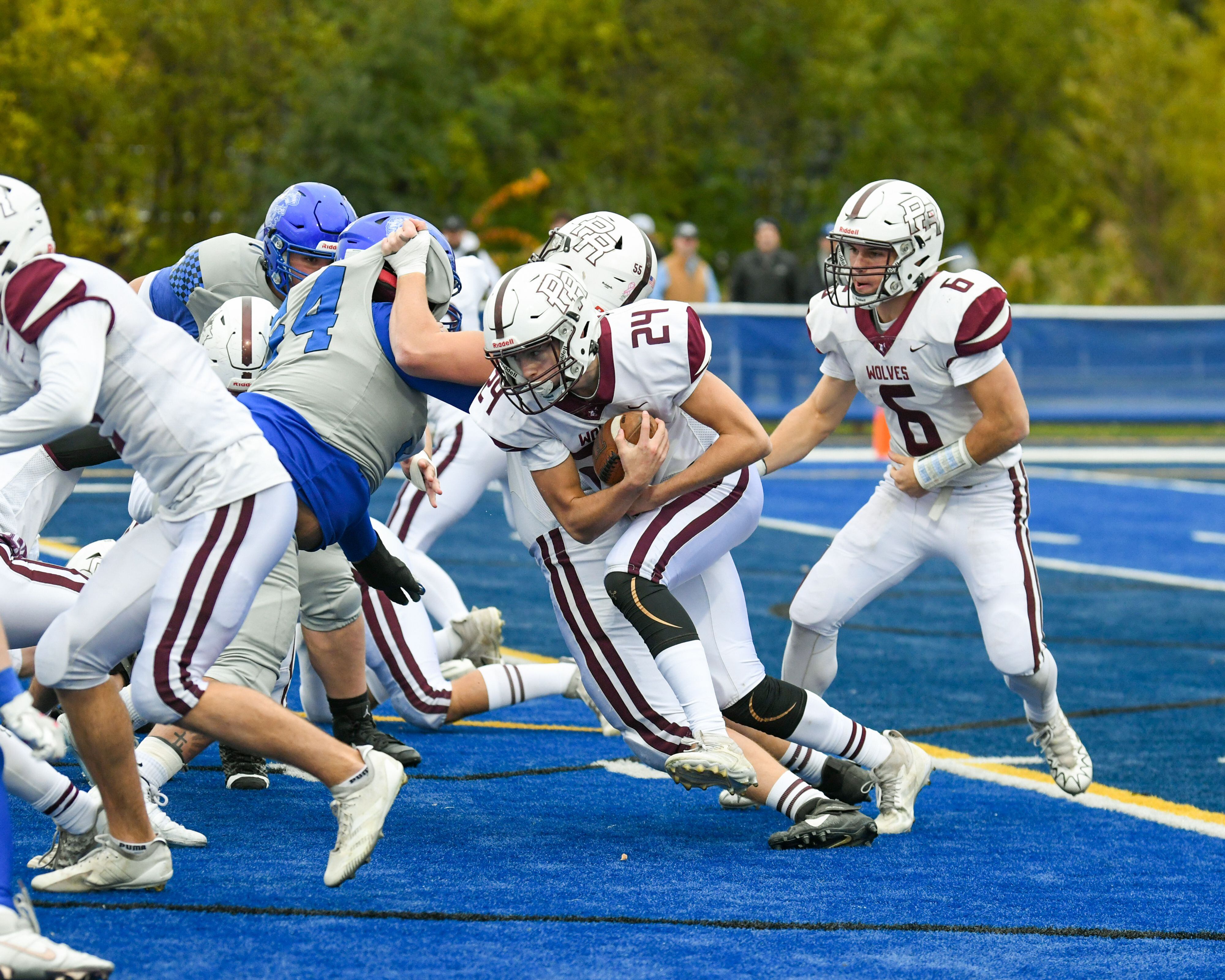 Prairie Ridge's Vincent Byk (24) runs the ball during the second round of the 5A playoff game against St. Francis on Saturday Nov. 8, 2025, held at St. Francis's High School.