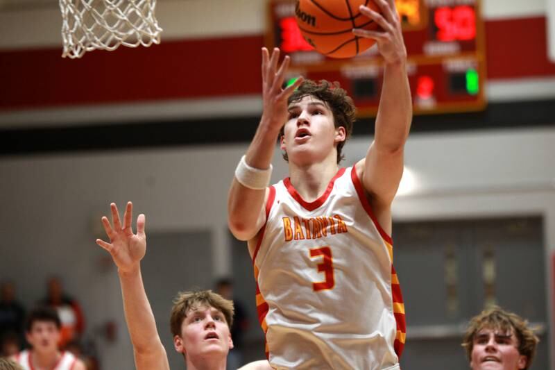 Batavia’s Jax Abalos gets a shot up during a game against Geneva on Friday, Dec. 20, 2024 in Batavia
