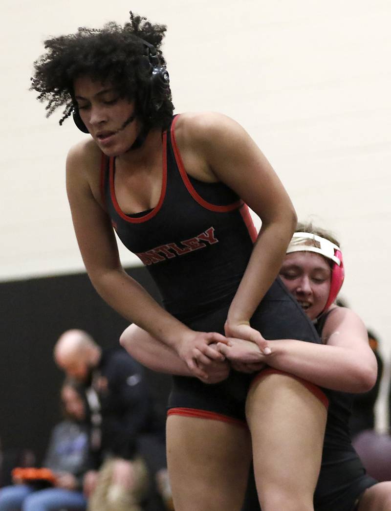 Huntley’s Nariah Adams escapes the grasp of grasp of Morris’ Tessa Niekirk in the 140-pound match of a nononference wrestling meet on Wednesday, Jan. 22, 2025, at Huntley High School.