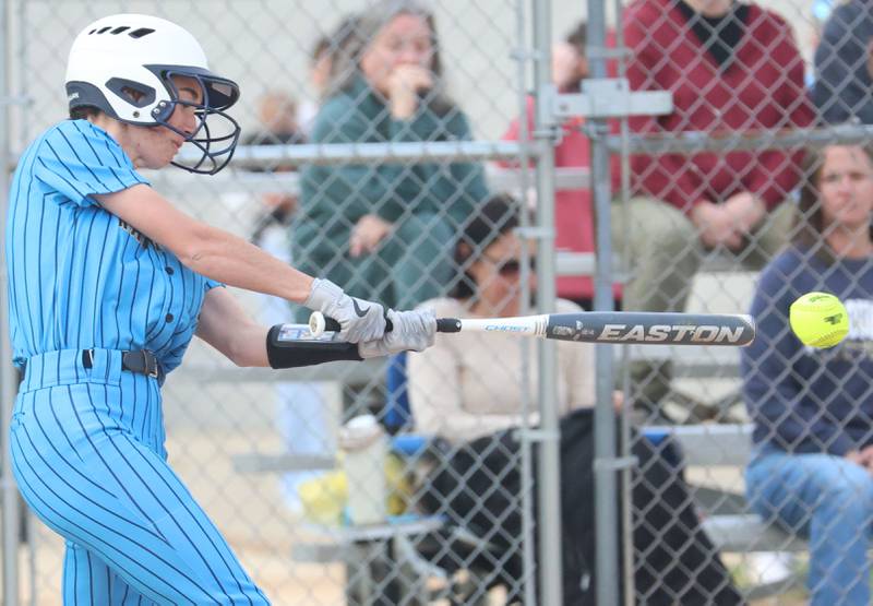 Marquette's Madisyn Trainor makes contact with the ball against Mendota on Wednesday, March 25, 2026 at June Gross Field in Ottawa.