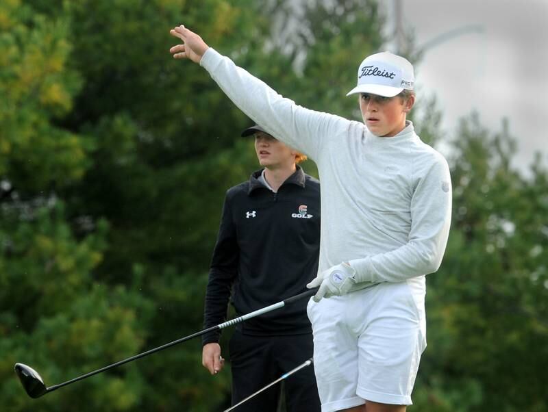 Minooka's T. J. Quinn tries to will his drive to the right on the 3rd tee, during the Southwest Prairie Conference boys golf meet at Blackberry Oaks Golf Course in Bristol on Wednesday, Sept. 20, 2023.
