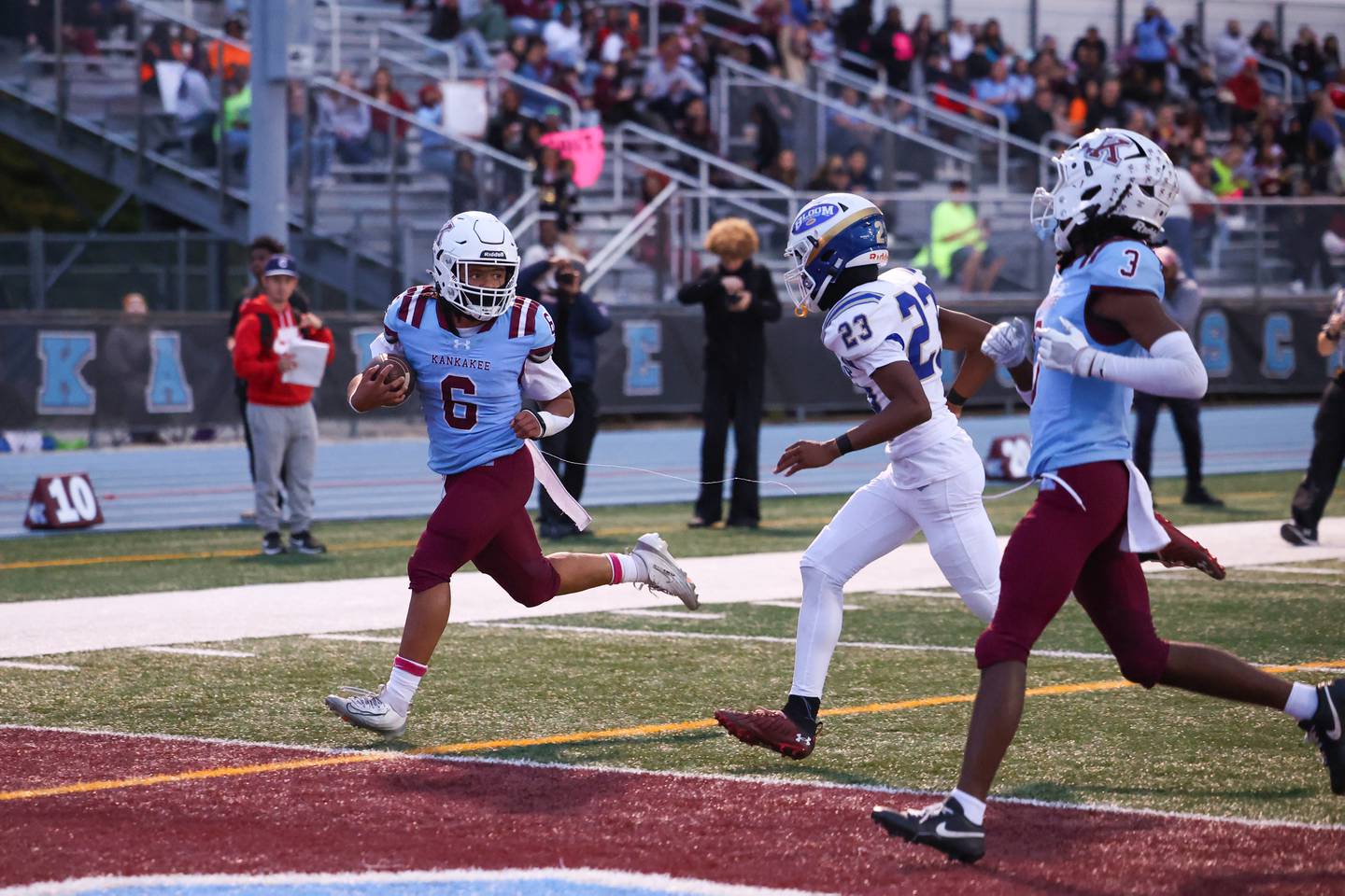 Kankakee's Zayden Henley runs in a touchdown during the Kay's victory over Bloom on Friday, Oct. 10, 2025.