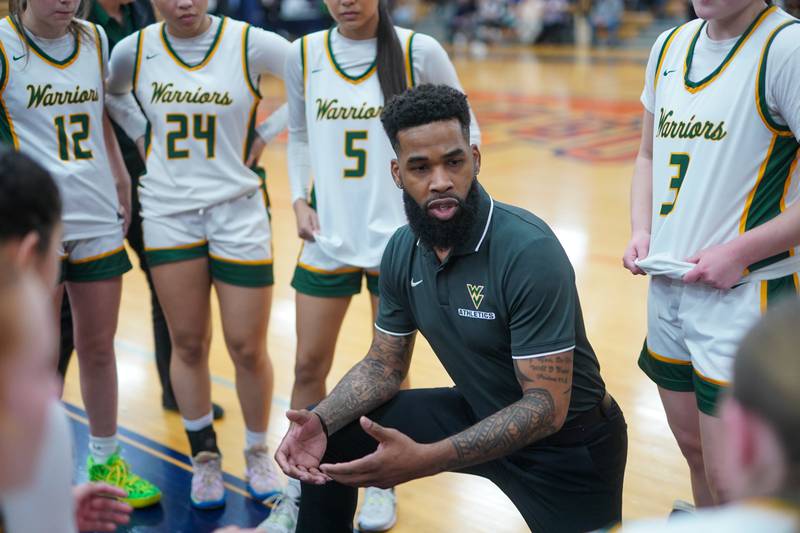 Waubonsie Valley's head coach Brett Love talks to his players during a Class 4A Oswego Sectional final basketball game against Benet at Oswego High School on Thursday, Feb 22, 2024.
