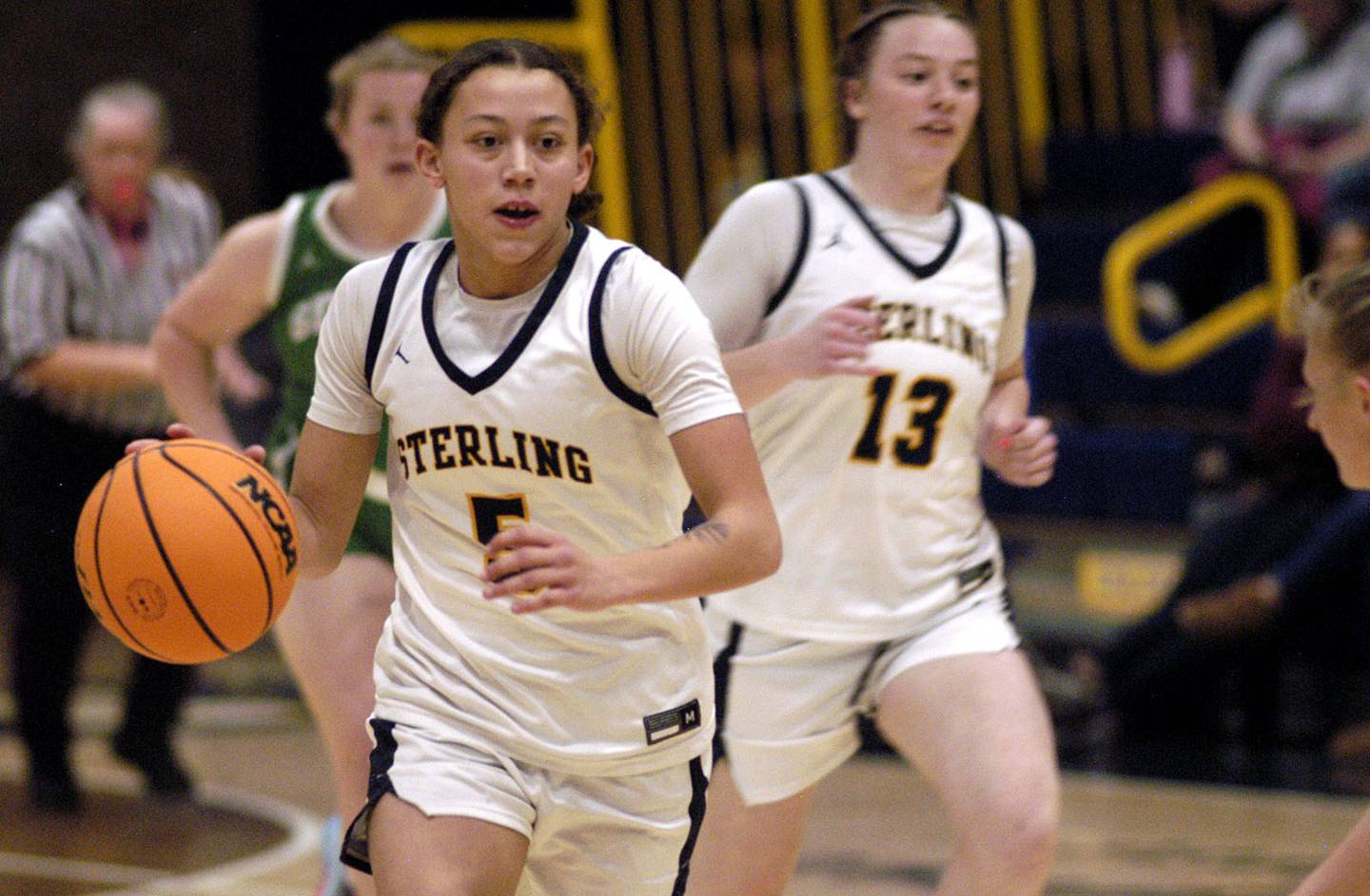Sterling's Anessa Johnson brings the ball upcourt. Sterling girls basketball hosted Geneseo at Musgrove Fieldhouse in Sterling. The action took place on Thursday, December 11, 2025.