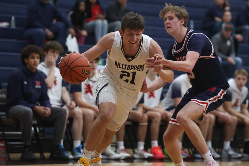 Joliet Catholic’s Owen Wiers makes a move to the basket against St. Viator.