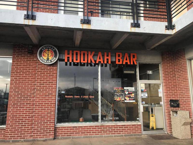 Cameron Dye, one of the four owners of Aroma's Hookah Bar, 811 W. Lincoln Highway in DeKalb, across the street from the DeKalb Police Department, said he will welcome patrons to bring their own marijuana and smoke it in his bar starting Tuesday.