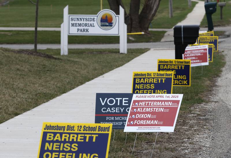 Campaign sign on Tuesday, April 1, 2025. in front of the Johnsburg Village Hall.