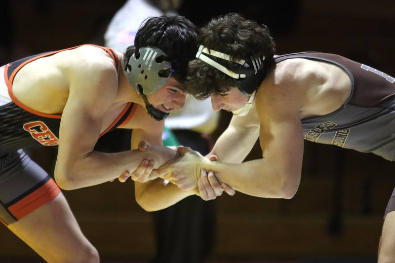Jacobs’ Luke Flaskamp, right, battles Crystal Lake Central’s Nick Zuehlke at 150 pounds in varsity wrestling on Thursday, Jan. 16, 2025, at Jacobs High School in Algonquin.