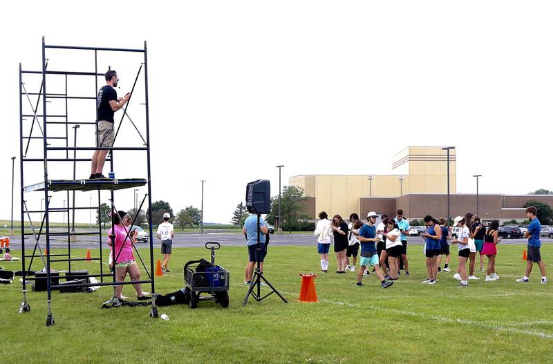 New Kaneland High School Band Director Kyle Baltzer directs the Kaneland Marching Knights during band camp on Friday, August 2, 2024 in Maple Park.