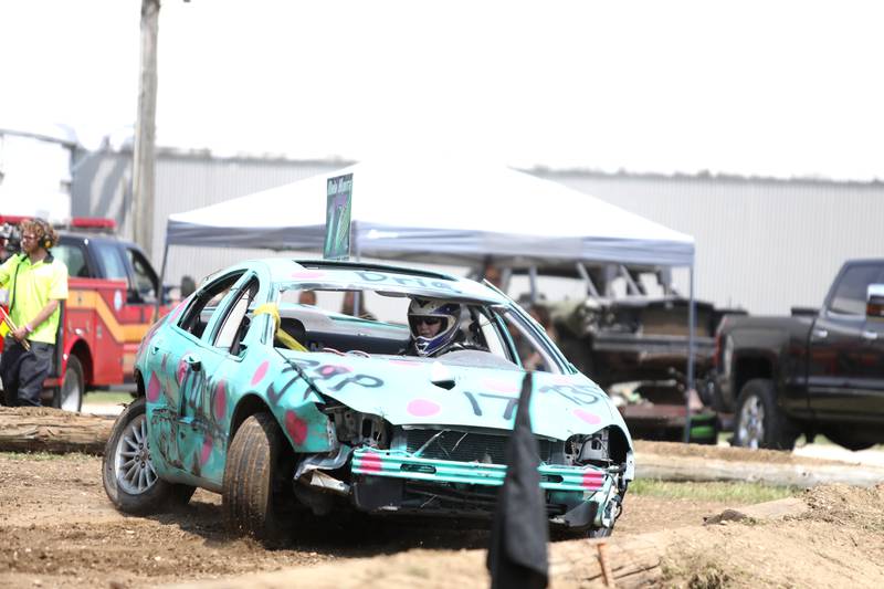 Dria Kuntz competes in the demolition derby during the 155th Kane County Fair in St. Charles on Sunday, July 21, 2024.