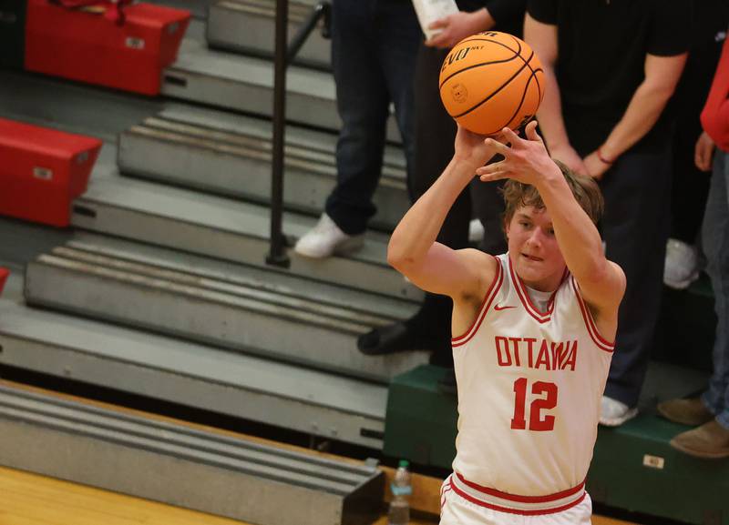 Ottawa's Jack Carroll shoots a wide-open jump shot against Streator during the Class 3A Regional semifinal game on Wednesday, Feb. 25, 2026 in Sellett Gymnasium at L-P High School.