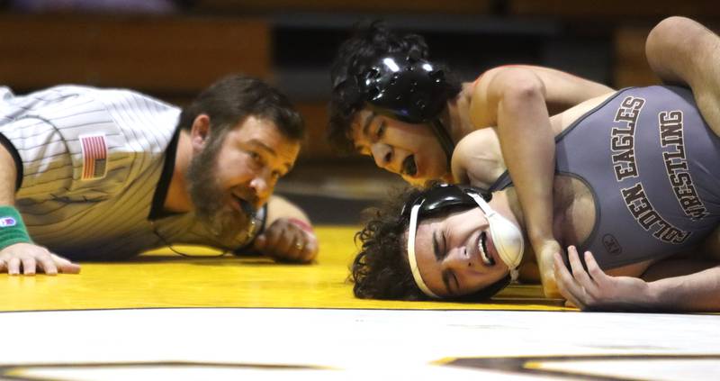 Jacobs’ Ryan Chehade, bottom, battles Crystal Lake Central’s Abe Palomino at138 pounds in varsity wrestling on Thursday, Jan. 16, 2025, at Jacobs High School in Algonquin.