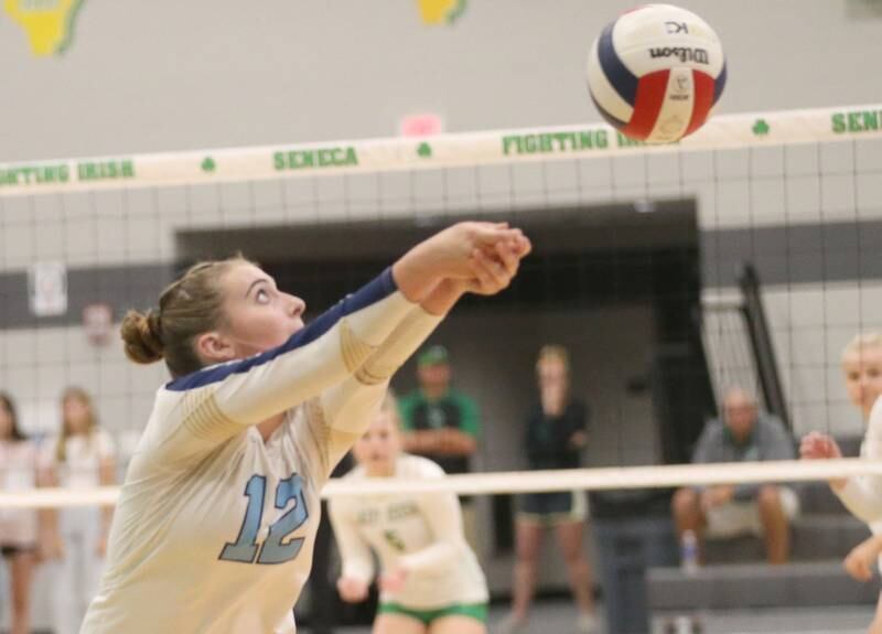 Marquette's Kinley Rick returns a serve from Seneca on Thursday, Sept. 19, 2024 at Seneca High School.