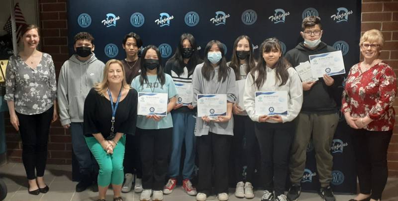 Students from left: Noel Lopez, Peng Liang Heng, Quyen Tu Tran, Elizabeth Gonzalez-Navarro, Iris Thammavongsa, Stephanie Ceballos, Yoselin Renteria and Diego Diaz. Staff from left: Troy Middle School English Language Learners Specialists Maggie Etherington and Kristin Dahl, and T.M.S. Principal Renee Marski