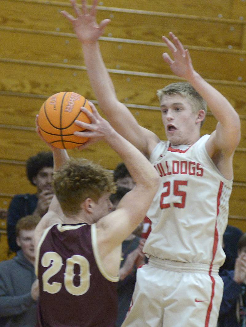 Streator’s Joseph Hoekstra sets to block a pass by Morris’s RJ Kennedy in the 1st quarter Wednesday at Streator.