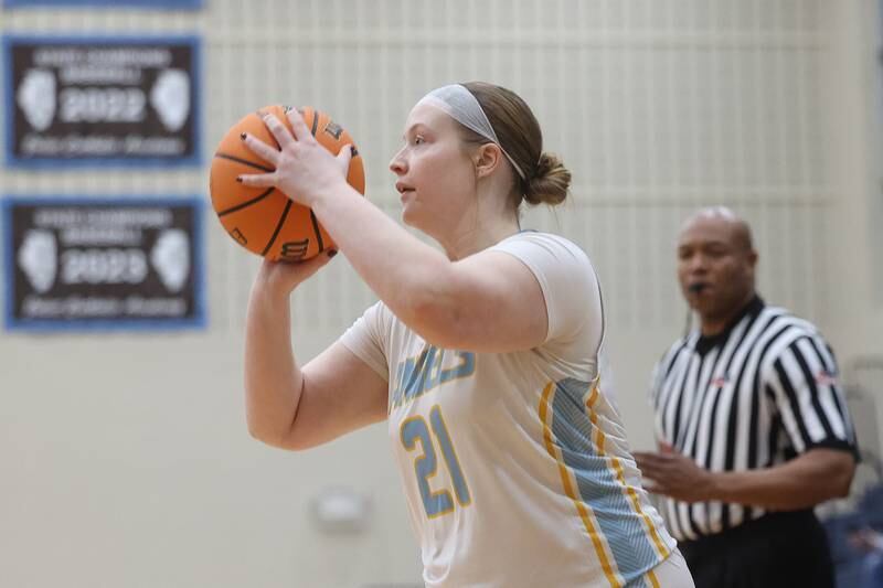 Joliet Catholic’s Emma Birsa takes the outside shot against Carmel on Wednesday, Jan 15, 2025 in Joliet.