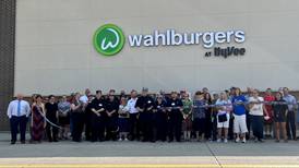 Crowd gathered for Wahlburgers grand opening Tuesday morning