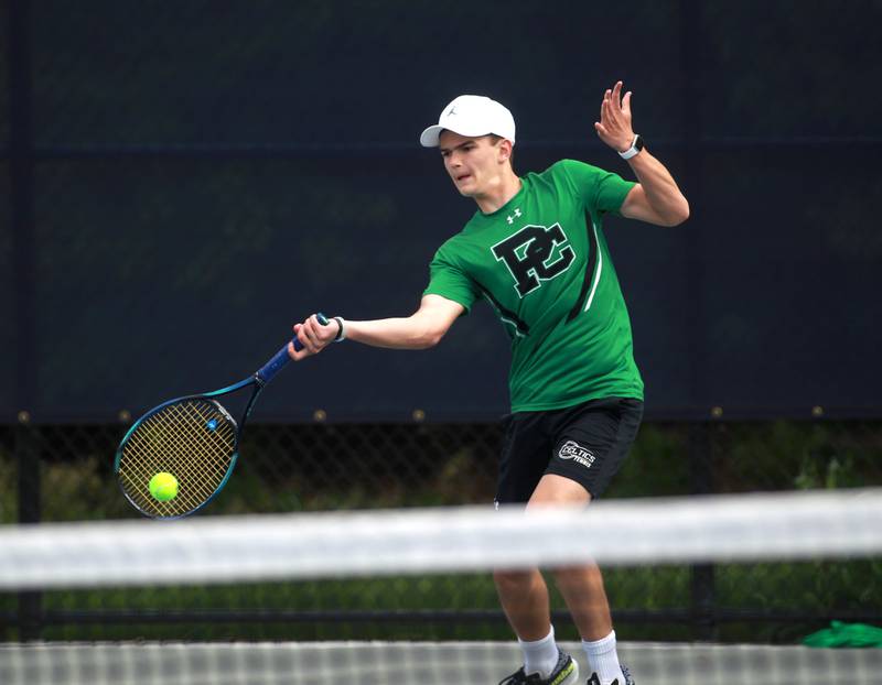 Providence Catholic’s Jesse Tyler returns the ball during the first round of the 1A boys state tennis meet on Thursday, May 29. 2025 at Buffalo Grove High School.