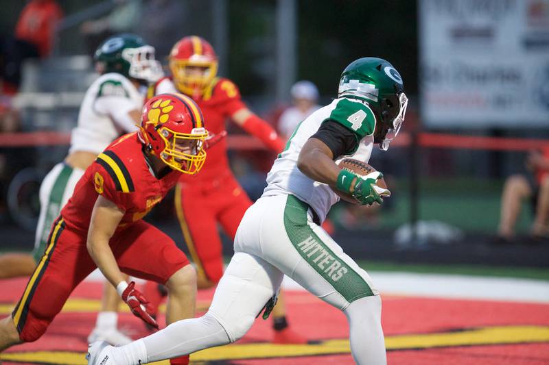 Glenbard West's Jamarcus Kelly runs the ball in for a touchdown against Batavia on Friday, Aug.29,2025 in Batavia.