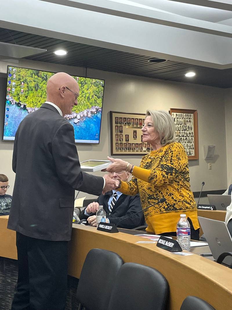 “I wish you all the best going forward,” La Salle County Board member Pamela Beckett (D-Ottawa) told her colleagues Wednesday, Nov. 27, 2024. Beckett was one of four outgoing members to accept service plaques from Chairman Don Jensen (left). Also honored were Democrats Mike Kasap of La Salle, Gelinda Heller of Peru and LouAnne Carretto of Ottawa.