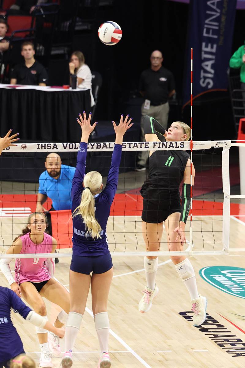 Providence's Abbey Knight hits the ball to Nazareth during Nazareth's victory in two sets, 25-16, 25-17, over Providence in the IHSA Class 3A State semifinals on Friday, Nov. 14, 2025.