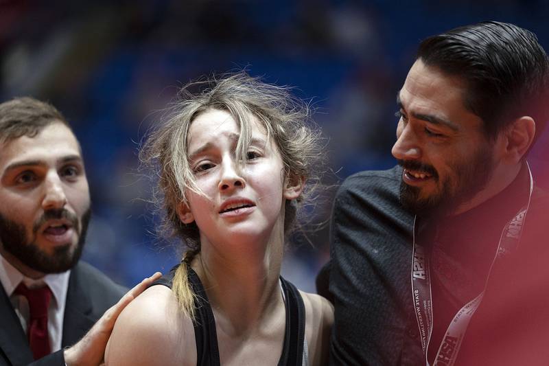 Ayane Jasinski of Fox Lake Grant comes off the mat after winning the 110 pound championship match at the IHSA girls state wrestling championships Saturday, Feb. 25, 2023.