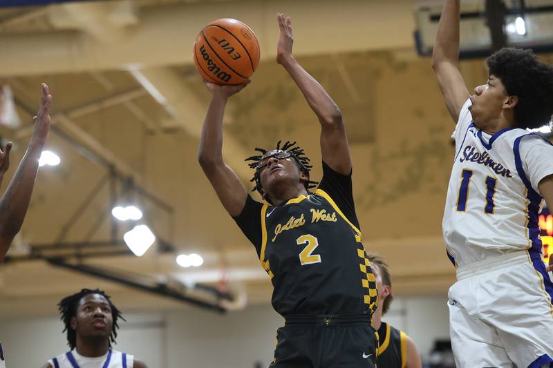 Joliet West’s Elijah Wilson puts up a shot against Joliet Central on Thursday, Jan. 15, 2026 in Joliet.