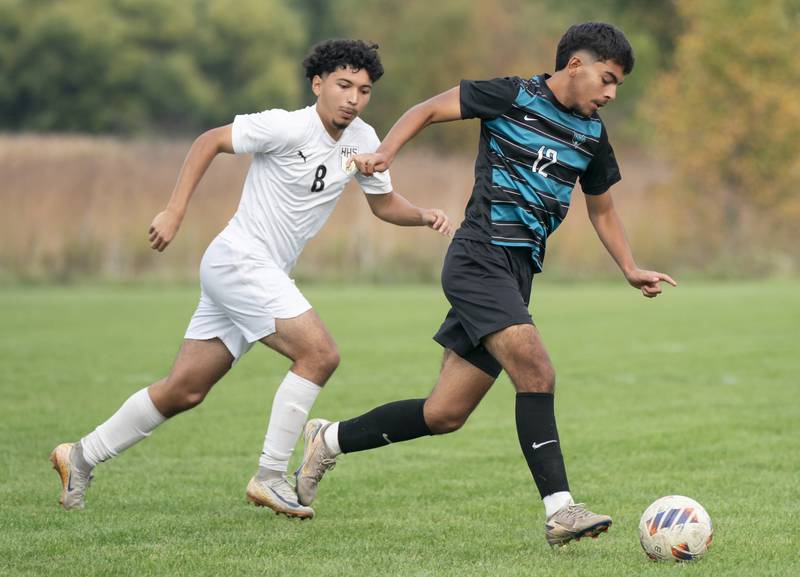 Harvard's Edgar Robles defends Woodstock North's Ruben Carreno during the Kishwaukee River Conference Tournament Championship game on Monday, October 6, 2025 at Woodstock North High School. Ryan Rayburn for Shaw Local