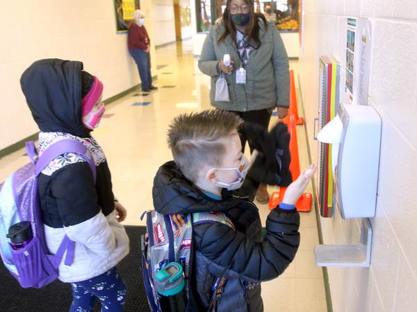 Days before school returns amid a viral surge, DeKalb District 428 officials urge testing