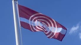 Lockport raises newly designed city flag at Heritage Village