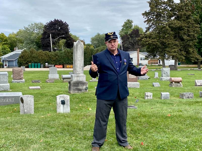 Wayne Mansfield, member of the Sons of Union Veterans of the Civil War, presents on John R. Petrie, a Sycamore Civil War veteran who lived from 1836 to 1923. Petrie served as a private corp. in the 6th Illinois Infantry. Mansfield spoke at the DeKalb County History Center’s annual Etched in Stone Cemetery Walk at Elmwood Cemetery, 901 S. Cross St., Sycamore on Sunday, Oct. 8, 2023.