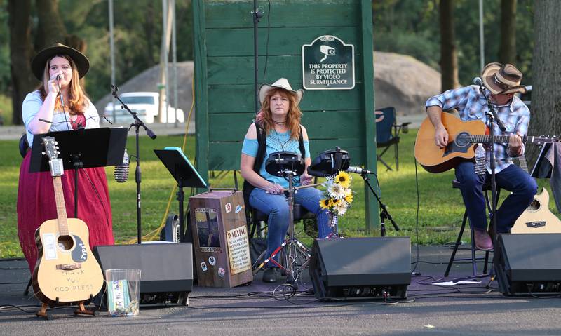 Members of the group Tailgate Confessions play during the Friday Night Market's event on Friday, Aug. 18, 2023 at Kirby Park in Spring Valley. These well-loved markets, traditionally held on the third Friday of each month, moved from the downtown location in the mini park to the captivating and spacious Kirby Park. Fireworks concluded the event.