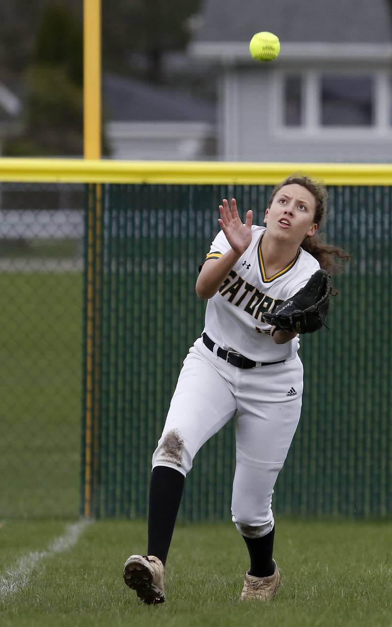 Crystal Lake South's Amelia Cervantes chases down a fly ball during a Fox Valley Conference softball game Monday, April 25, 2022, between Crystal Lake South  and Jacobs at Crystal Lake South High School.