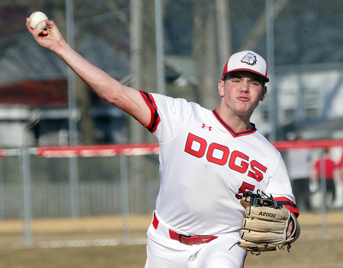 Streator's Adam Williamson (5) delivers a pitch to Woodland/Flanagan-Cornell on Wednesday, March 16, 2022, in Streator.