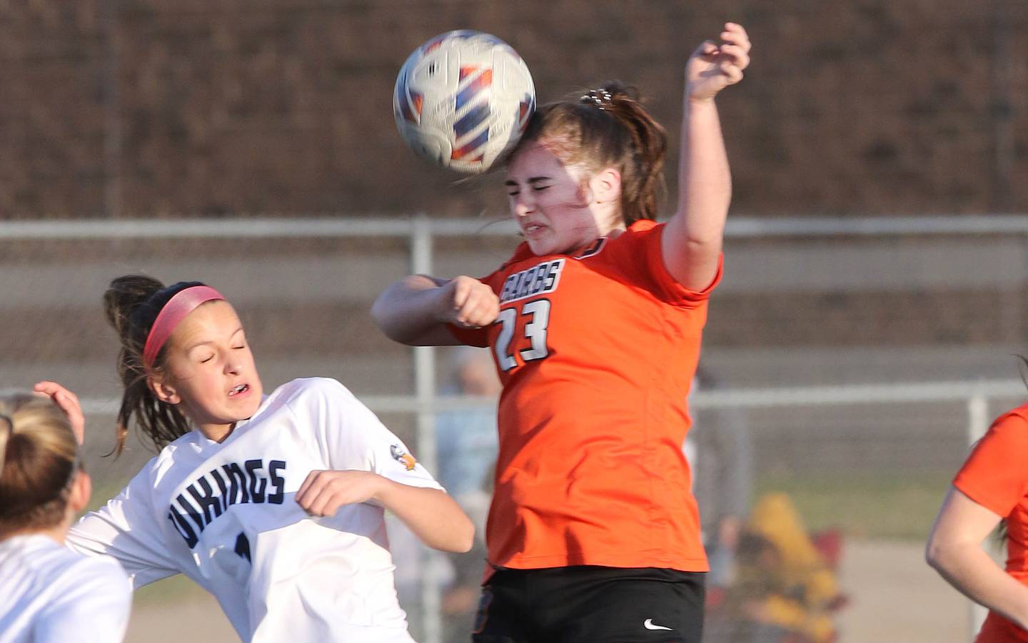 DeKalb's Addison Elshoff heads the ball past Guilford's Berkeley Stenstrom during their game Monday, April 10, 2023, at DeKalb High School.
