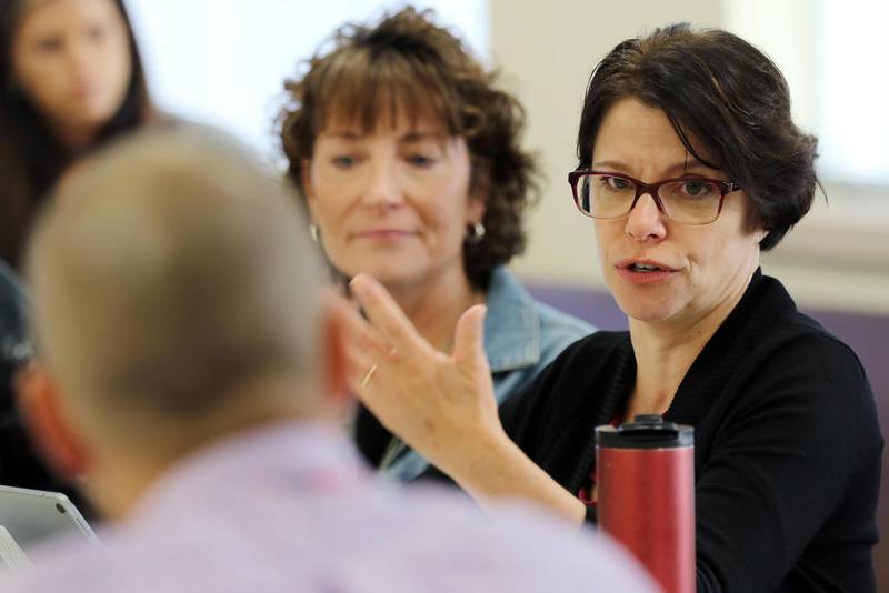 Suzanne Ness, right, speaks during a meeting of the public health and community services committee at the McHenry County Administrative Building on Thursday, Sep. 26, 2019 in Woodstock.