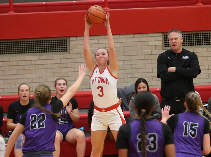 Ottawa's Skylar Dorsey looks to pass the ball as Dixon defenders Katie Drew, Ahmyrie McGowan and Morgan Hargrave apply pressure on Wednesday, Nov. 29, 2023 at Kingman Gym.