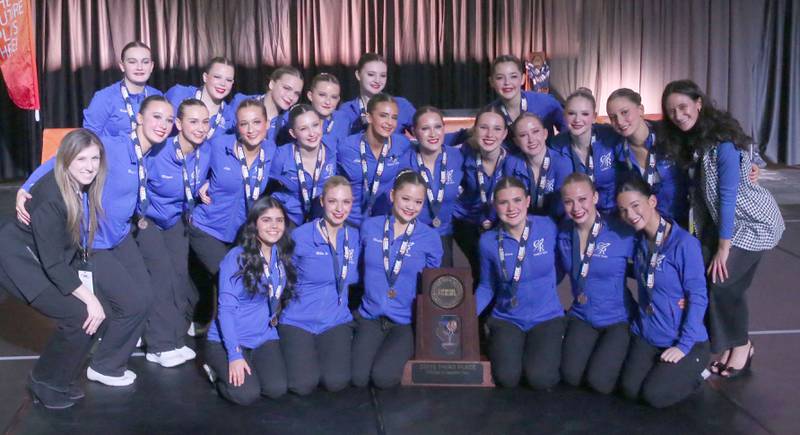 Members of the Burlington Central dance team pose with their Class 2A third-place trophy during the IHSA State Dance finals on Saturday, Feb. 1, 2025 at Grossingers Motor Arena in Bloomington.