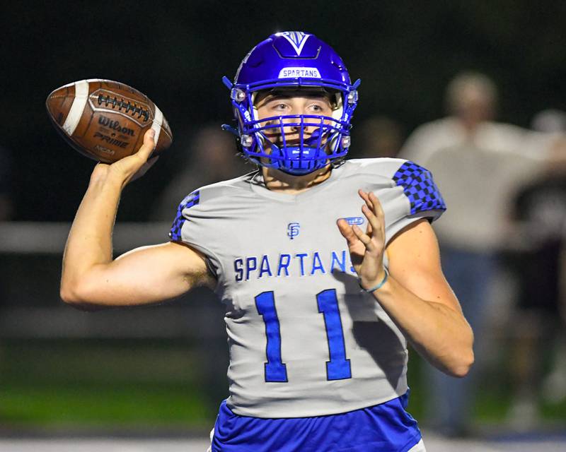 St. Francis’s Alessio Milivojevic (11) passes the ball in the first quarter Friday Sept. 22, 2023, while taking on Joliet Catholic Academy at St. Francis in Wheaton.