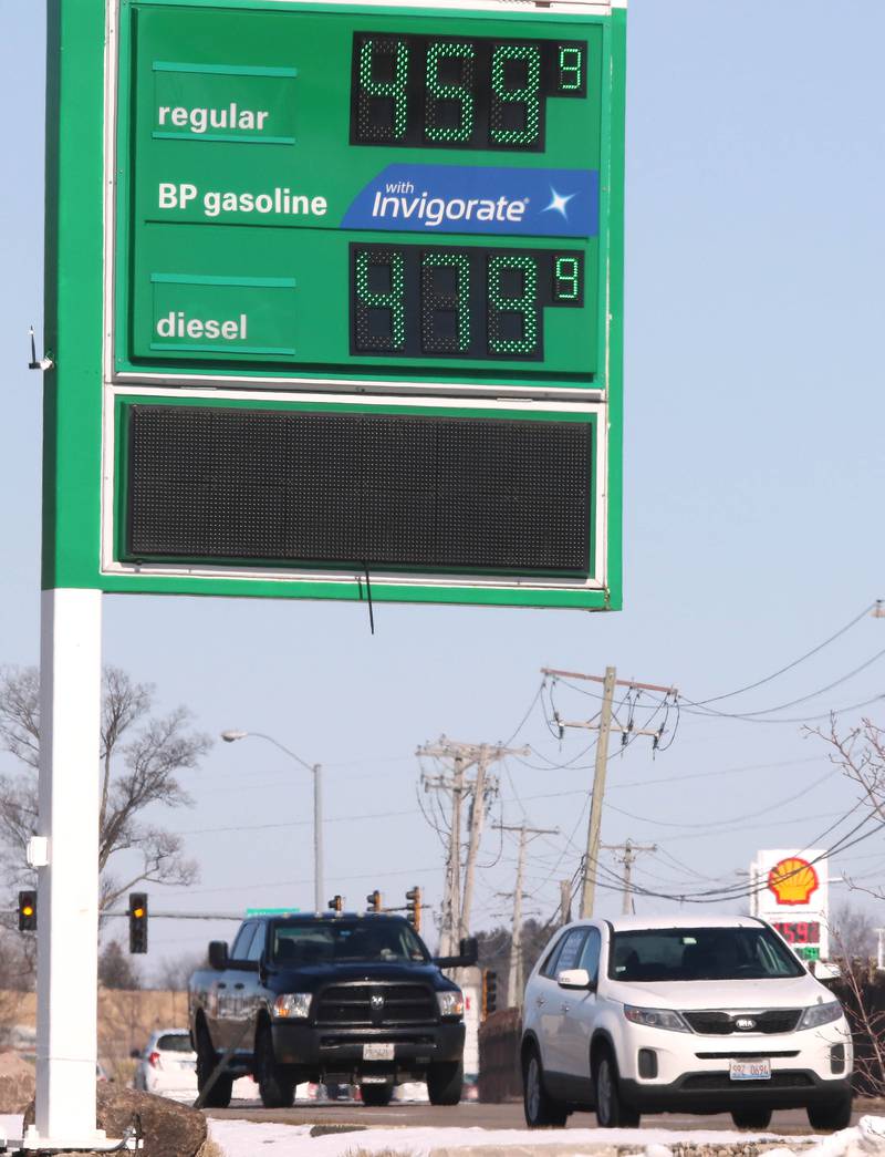 Cars drive by a gas station on Dekalb Avenue in Sycamore Tuesday, March 8, 2022, where gas was $4.59 for a gallon of regular unleaded gasoline. US gas prices hit an all time high this week.
