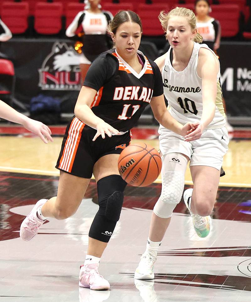 DeKalb's Ari Smith races up court ahead of Sycamore's Lexi Carlsen during the First National Challenge Friday, Jan. 27, 2023, at The Convocation Center on the campus of Northern Illinois University in DeKalb.