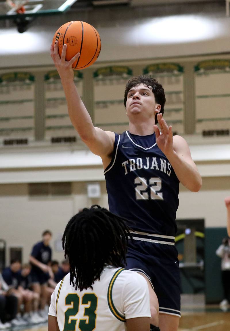 Cary-Grove's Adam Bauer shoots the ball over Crystal Lake South's David Mcfadden during a Fox Valley Conference boys basketball game on Friday, Jan. 23, 2026, at Crystal Lake South High School.