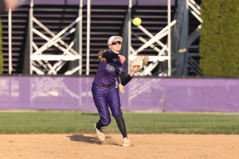 Wilmington's Nina Egizio throws to first base during the Wildcats' 9-7 loss to Manteno on Tuesday, April 8, 2025.