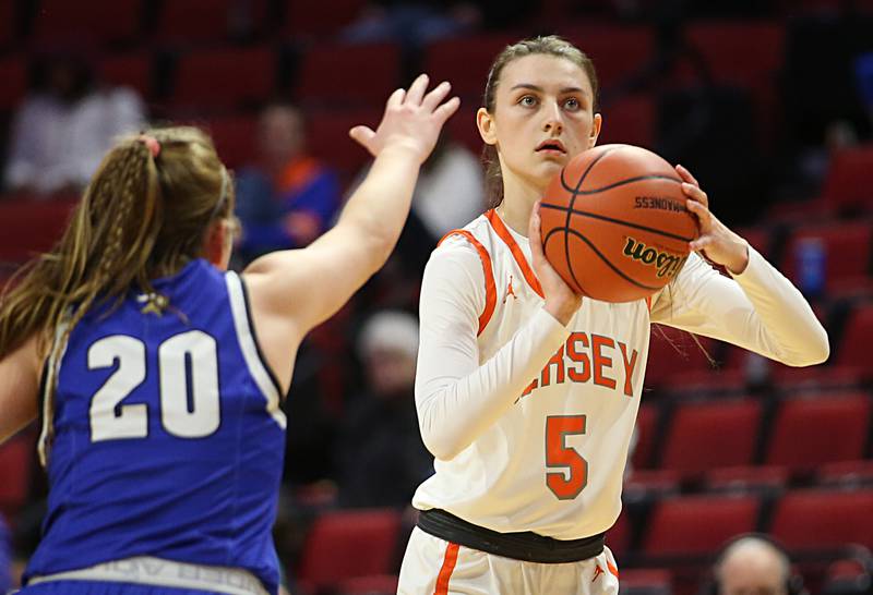 Hersey's Katy Eidle shoots a jump shot over Geneva's Caroline Madden during the Class 4A third place game on Friday, March 3, 2023 at CEFCU Arena in Normal.