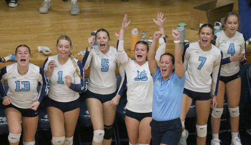 Members of the Marquette volleyball team react after getting a kill against Newark on Wednesday, Aug. 27, 2025 in Bader Gymnasium.