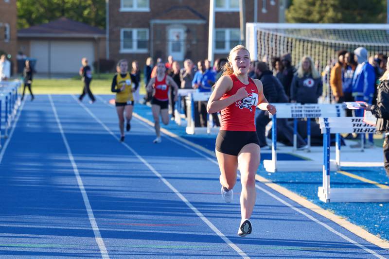 Lincoln-Way Central's Brea Counihan nears the finish line in first place in the 3200-meter race during the IHSA Class 3A Chicago Heights Girls Track and Field Sectional at Bloom High School on Wednesday, May 13, 2026.