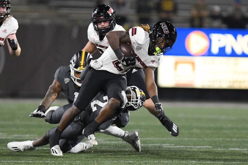NIU running back Jaiden Credle looks for room to run against Western Michigan on Wednesday, November 9, 2022.