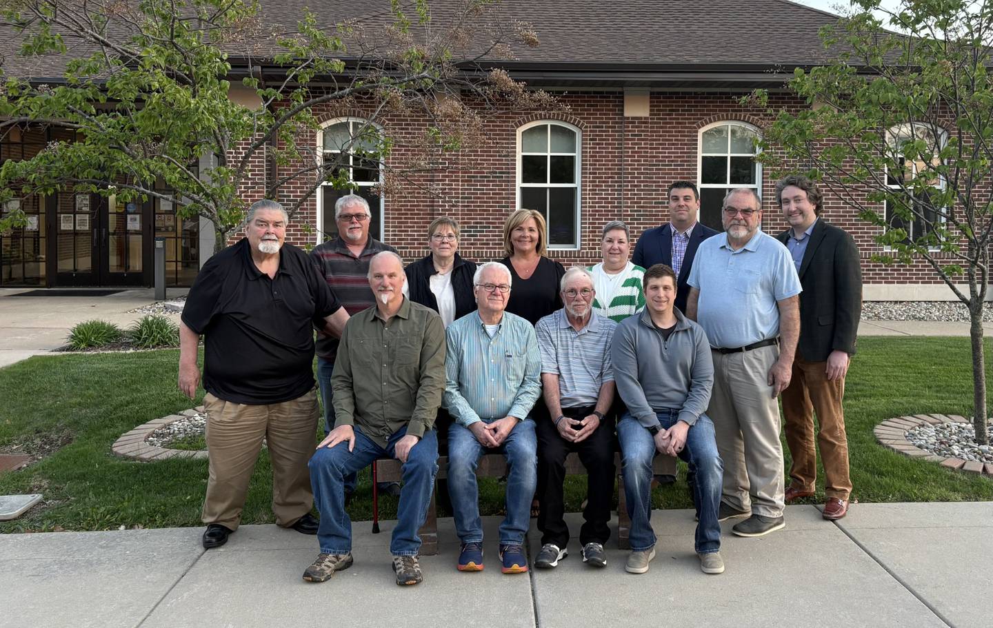 Spring Valley’s city government, including the mayor and newly elected council members, poses for a photo outside City Hall following their meeting on Monday, April 21, 2025.