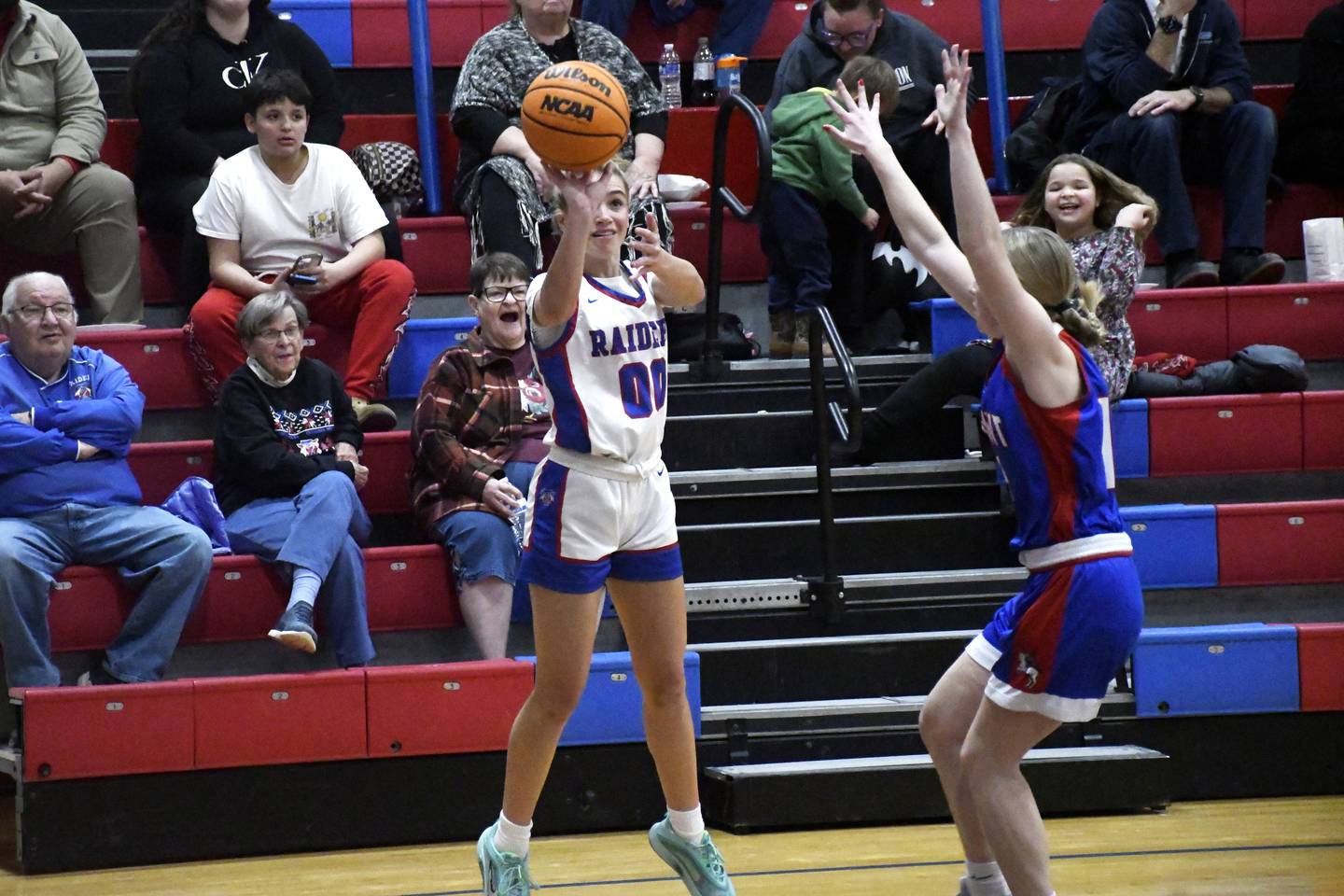 Iroquois West's Amelia Scharp shoots a three pointer during Iroquois West's 35-29 win over Tri-Point in the Iroquois West Holiday Tournament on Wednesday, December 17, 2025.