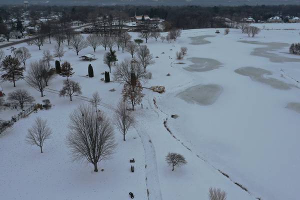 Photos: Baker Lake walking path complete but remains closed admist snowfall